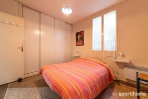 Ένα ή περισσότερα κρεβάτια σε δωμάτιο στο MAZET avec spa