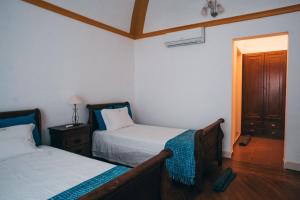 Giường trong phòng chung tại Guesthouse da Vila