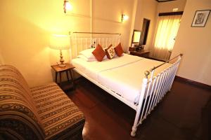 Postel nebo postele na pokoji v ubytování Bandarawela Hotel