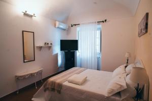 Giường trong phòng chung tại Guesthouse da Vila