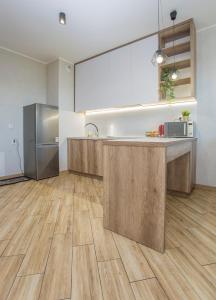 Kuchyňa alebo kuchynka v ubytovaní Urban Jungle - Vera Apartment