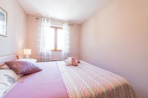 Postel nebo postele na pokoji v ubytování Penthouse Apartment Marija