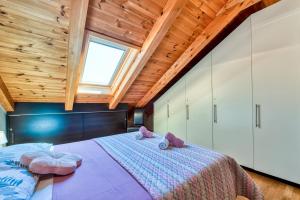 Postel nebo postele na pokoji v ubytování Penthouse Apartment Marija