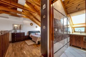 Postel nebo postele na pokoji v ubytování Penthouse Apartment Marija