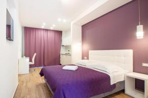 Luxury rooms Beach Mediteran客房内的一张或多张床位