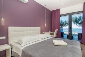 Postel nebo postele na pokoji v ubytování Luxury rooms Beach Mediteran