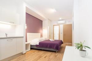Luxury rooms Beach Mediteran客房内的一张或多张床位