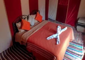 Un ou plusieurs lits dans un hébergement de l'établissement Desert Life Camp
