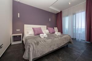 Luxury rooms Beach Mediteran客房内的一张或多张床位