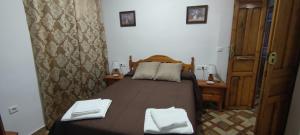 A bed or beds in a room at Rollo Campillo