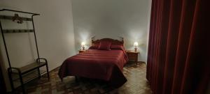A bed or beds in a room at Rollo Campillo