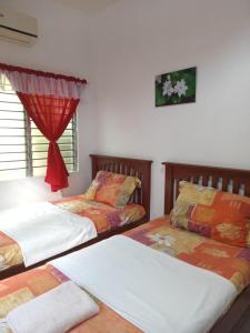 Postel nebo postele na pokoji v ubytování Felipa Beach Residence - Jasmine