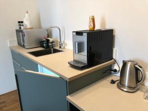 Coffee and tea making facilities at Bolton Boulevard Beach Rooms