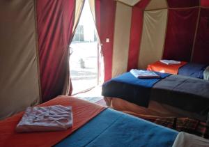 Un ou plusieurs lits dans un hébergement de l'établissement Desert Life Camp