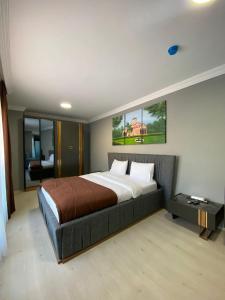 Postel nebo postele na pokoji v ubytování Yaman Suite Apart