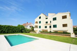 Πισίνα στο ή κοντά στο One Bedroom Apartment Bonsai with shared Pool