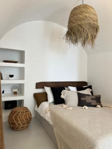 A bed or beds in a room at Delta Suites