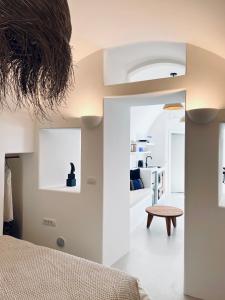 A bed or beds in a room at Delta Suites