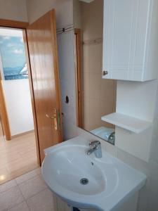 Kúpeľňa v ubytovaní Apartman Vučemil + 21 fotografií