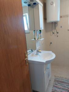 Kúpeľňa v ubytovaní Apartman Vučemil
