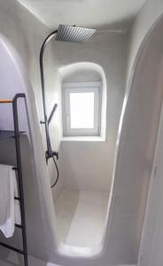 A bathroom at Delta Suites