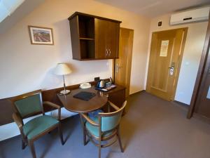 Posedenie v ubytovaní Zámecký Hotel Zlatý Orel
