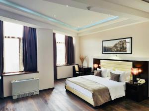 Katil atau katil-katil dalam bilik di Hotel Orion Tbilisi