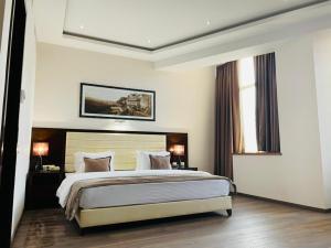 Katil atau katil-katil dalam bilik di Hotel Orion Tbilisi