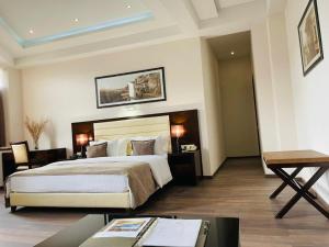 Katil atau katil-katil dalam bilik di Hotel Orion Tbilisi