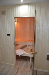 Postel nebo postele na pokoji v ubytování Visit sauna Klinovec