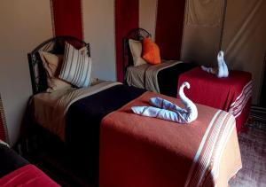 Un ou plusieurs lits dans un hébergement de l'établissement Desert Life Camp
