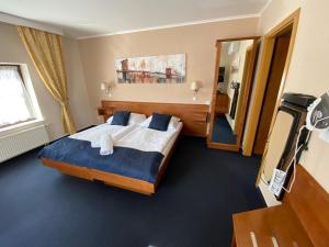 Posteľ alebo postele v izbe v ubytovaní Zámecký Hotel Zlatý Orel