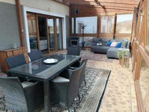 Posezení v ubytování Apartamenty pod Dzikowcem