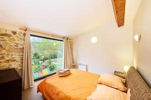 Katil atau katil-katil dalam bilik di Domaine - Vignoble - Jacuzzi - Sauna - 14 à 18 pers