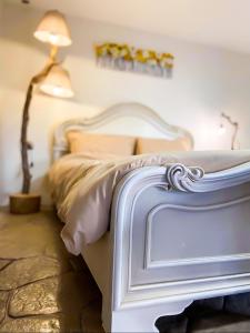Postel nebo postele na pokoji v ubytování Pistachio Guesthouse, Παραδοσιακός ξενώνας