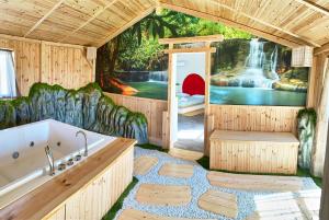 a bathroom with a waterfall mural on the wall at REnt room Japaroom in Anguillara Sabazia +45 photos