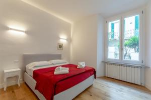 Posteľ alebo postele v izbe v ubytovaní Florence Michelangelo Suite Apartment