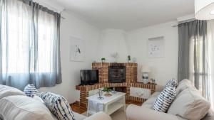 Posezení v ubytování Villa Arancha Nerja by Ruralidays