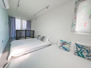 Postel nebo postele na pokoji v ubytování SHOW Liquiu B&B