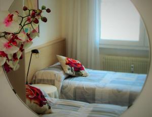 Postel nebo postele na pokoji v ubytování Bed & Breakfast Delle Rose