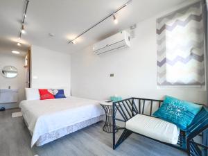Postel nebo postele na pokoji v ubytování SHOW Liquiu B&B