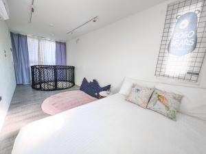 Postel nebo postele na pokoji v ubytování SHOW Liquiu B&B