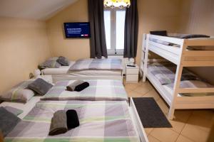 Voodi või voodid majutusasutuse Villa Papuk toas