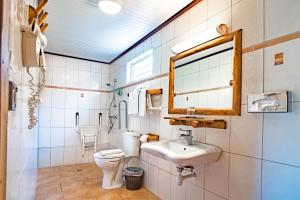 Baðherbergi á Hôtel Bambou & Spa