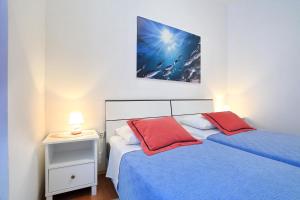 Postel nebo postele na pokoji v ubytování Apartment City Center Dragica