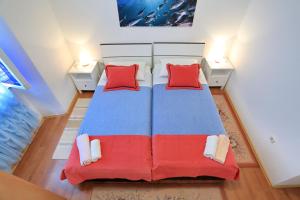 Postel nebo postele na pokoji v ubytování Apartment City Center Dragica