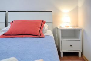 Postel nebo postele na pokoji v ubytování Apartment City Center Dragica