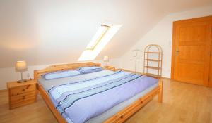 Posteľ alebo postele v izbe v ubytovaní Apartmán V sadu