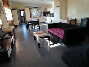 a living room with a couch and a table at La Pallissa 9 in Torroella de Montgrí