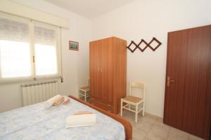 A bed or beds in a room at Borso D'Este 4